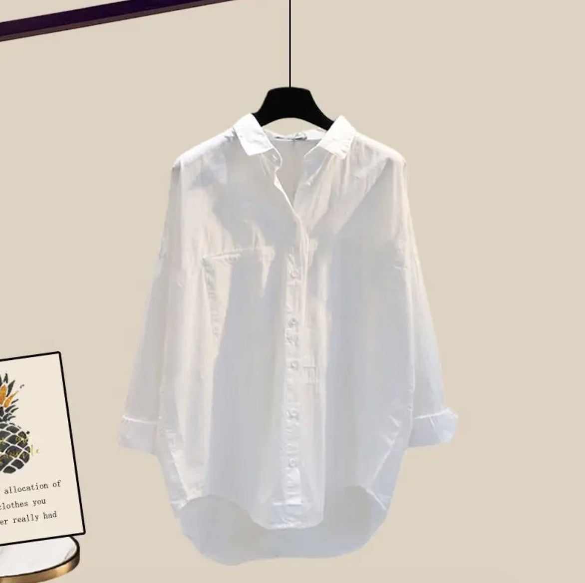 Completo donna Elettra con pantaloni svasati, camicia a maniche lunghe e top intrecciato, stile elegante e moderno per outfit raffinati