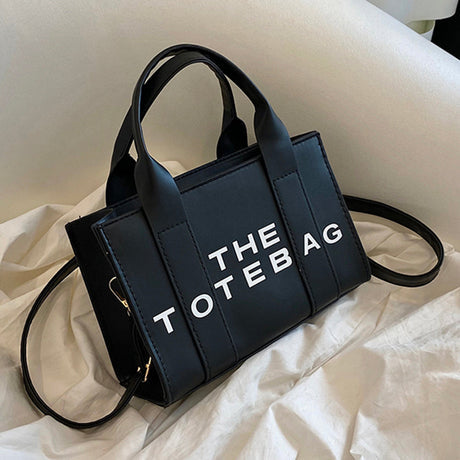 Borsa a spalla donna Giulianna elegante in materiale effetto pelle con tracolla regolabile