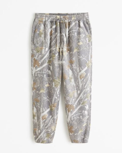 Pantaloni donna Elisa con stampa mimetica, vita elasticizzata e tasche laterali, perfetti per outfit casual e comodi