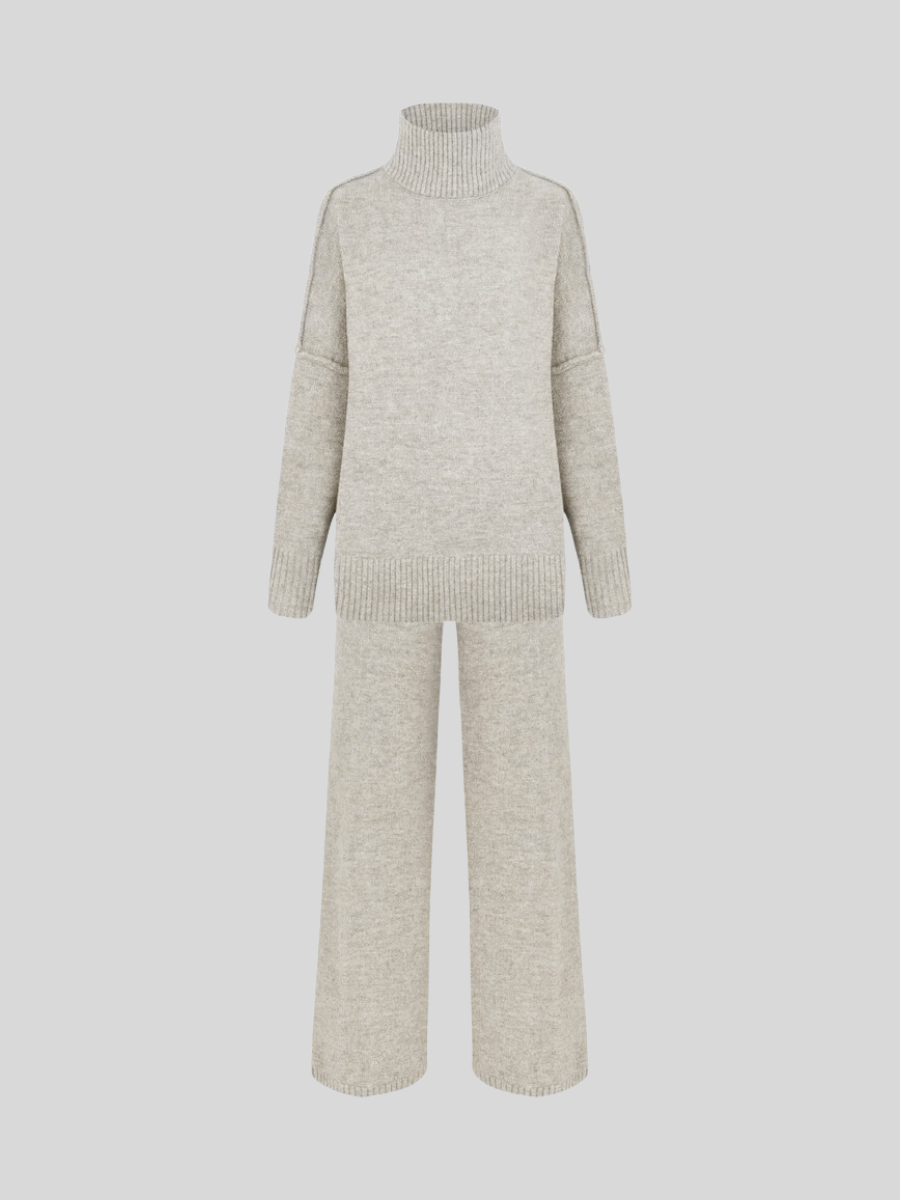 Completo donna Bettina chic fluido con pantaloni ampi e top a collo alto, look raffinato e moderno